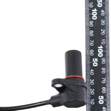 Reference image — crankshaft position sensor 0281002285, native mounting-ear bushing and rear-housing detail cropped from image4; not a new angle