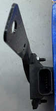 Load image into Gallery viewer, Reference image — aftermarket front TPMS trigger module 05033334AB — connector-end view with bracket edge; external native reference only, not actual stock