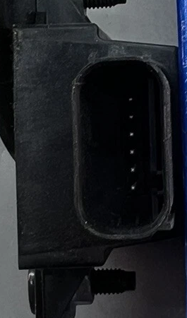 Reference image — aftermarket front TPMS trigger module 05033334AB — native connector socket and terminal-row detail; external native reference only, not actual stock