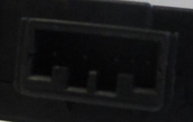 Reference image — HVAC air-door actuator motor 113800-2430, native connector socket/keying detail from side photograph (same-photo detail, not a new camera angle)