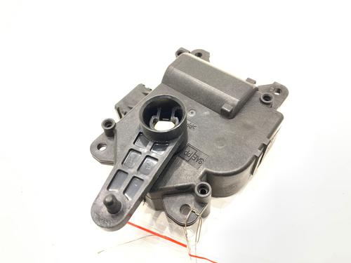 Reference image — HVAC air-door actuator 113800-3000, complete reverse housing with long ribbed crank lever and terminal locating pin