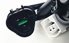 Reference image — cooling fan motor 262500-0111 — native same-photo detail of black and white connector faces and keying; not another angle; external illustration, not actual stock