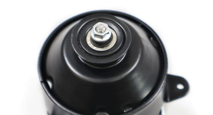 Reference image — cooling fan motor 263500-5480 — native front-face and shaft detail from source collage; lower body cropped, not a whole-motor view; external illustration, not actual stock