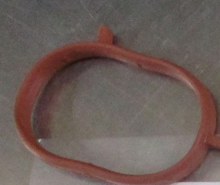 Load image into Gallery viewer, Reference photograph - intake manifold gasket 28411-2B600 - same-photo plan-view locating tab and end-outline detail