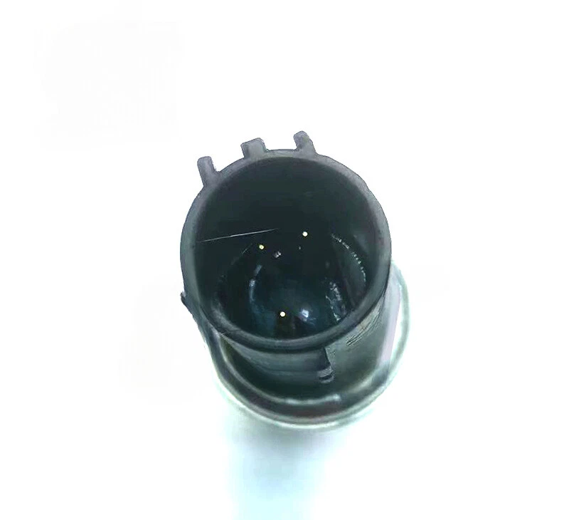 Reference image — aftermarket power steering pressure sensor 3F1A-3K215-AC — circular connector and visible terminal arrangement; native background-cropped reference, not actual stock