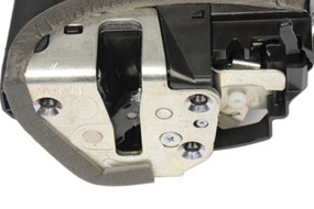 Reference image — aftermarket rear-left door lock/latch assembly 69060-06111 — native latch-interface detail: metal plate, opening, fasteners and white lever; external supplier reference, not actual stock