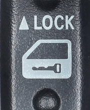 Load image into Gallery viewer, External reference image — lower-native-resolution detail crop of 84930-33080 lock-direction and door-key actuator markings, not another whole-unit angle; supplied aftermarket brand and packaging may differ.