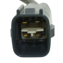 Load image into Gallery viewer, Reference image — downstream oxygen sensor 89465-0D220, native close-up of keyed four-contact connector face and pale divider