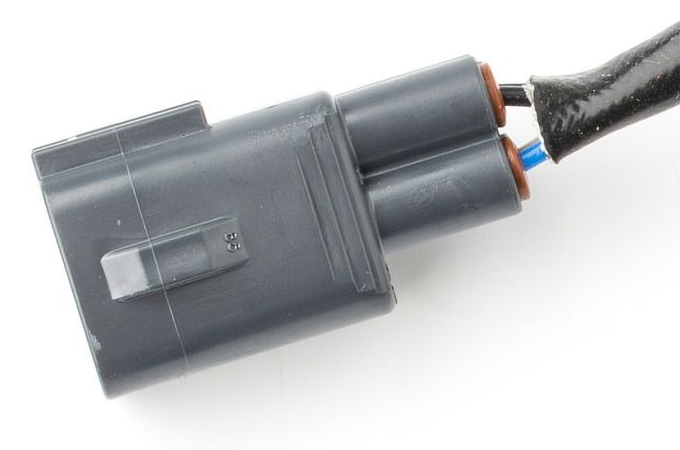 Reference image — aftermarket air-fuel ratio sensor 89467-12100 — native connector housing and wire-entry detail; external Denso direct-fit reference, not actual stock