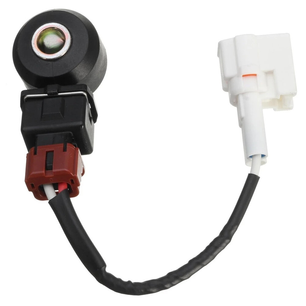 Knock sensor 22060-AA070 - full assembly top and mounting bore; reference photograph, not actual stock