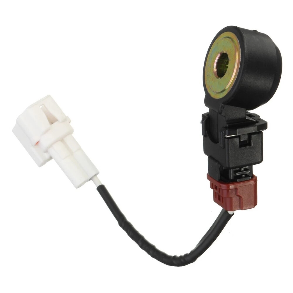 Knock sensor 22060-AA070 - underside mounting face and lead; reference photograph, not actual stock