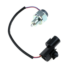 Load image into Gallery viewer, Transfer Case Switche MB896028 - plunger and connector side view; reference photograph, not actual stock